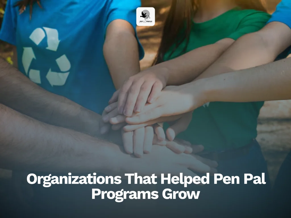 A group of people stack their hands together in unity, with the text "Organizations That Helped Pen Pal Programs Grow" displayed at the bottom.